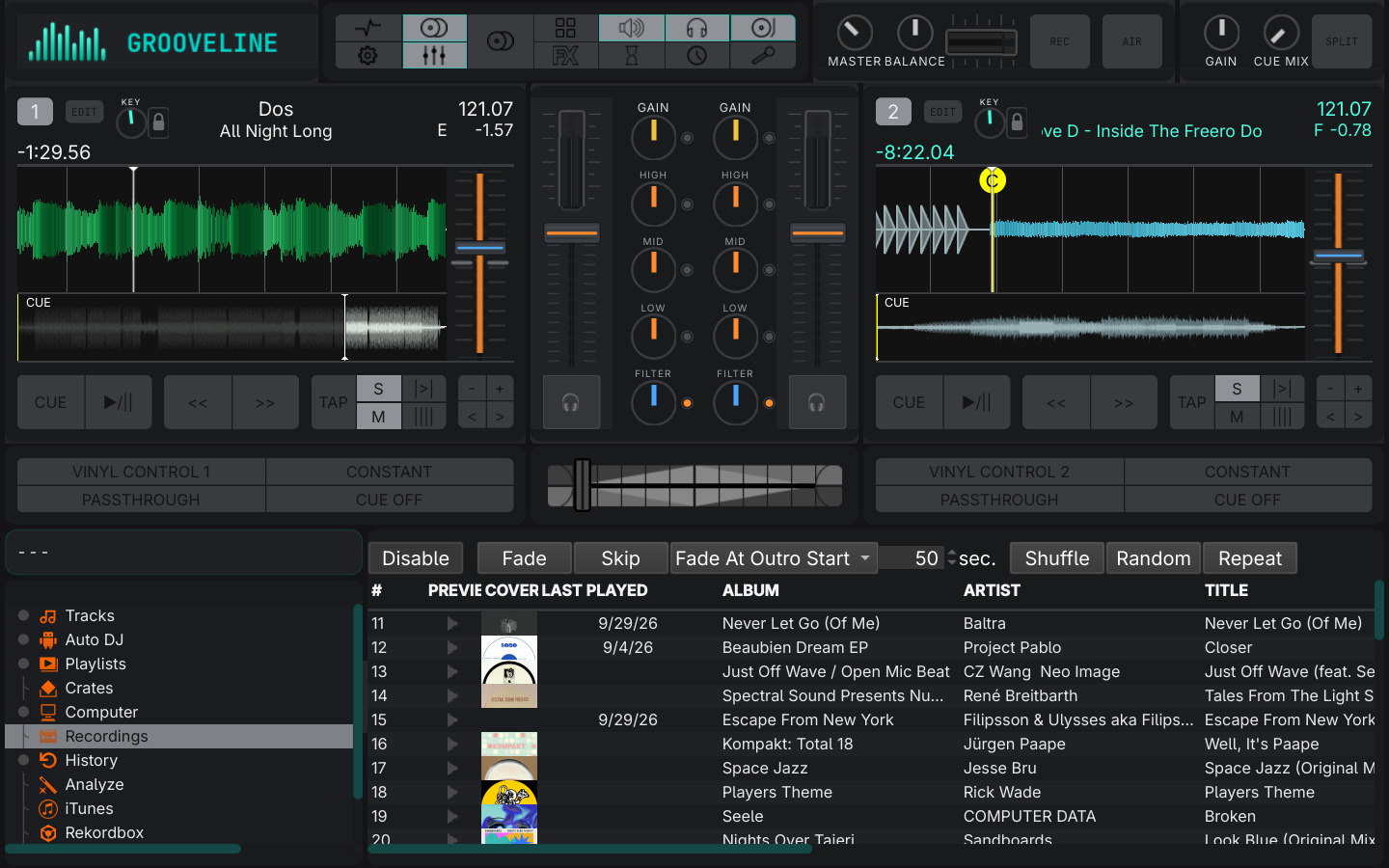 Mixxx running the Grooveline skin: two decks with waveforms, a mixer with orange faders and colour-coded knobs, the Grooveline logo in the header, and the music library below.